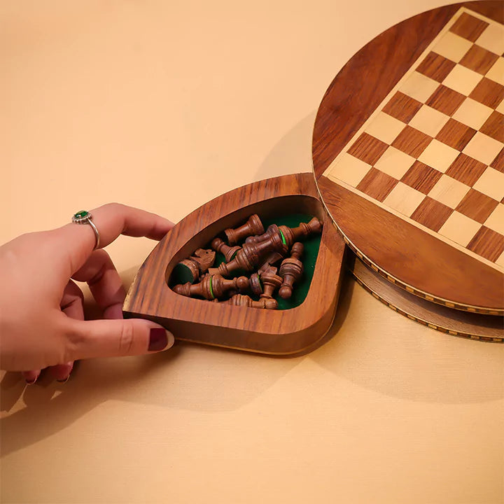 Wooden chess set with pieces and board on a beige background
