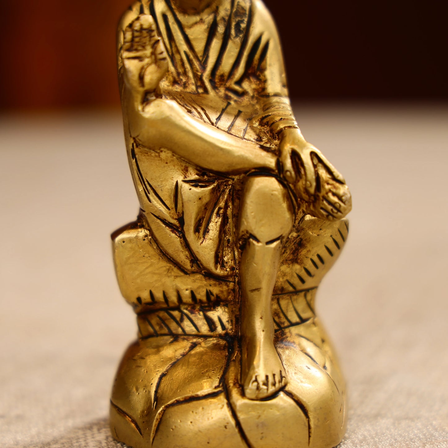 4.5 Brass Lord Sai Baba Idol Seated on Pedestal