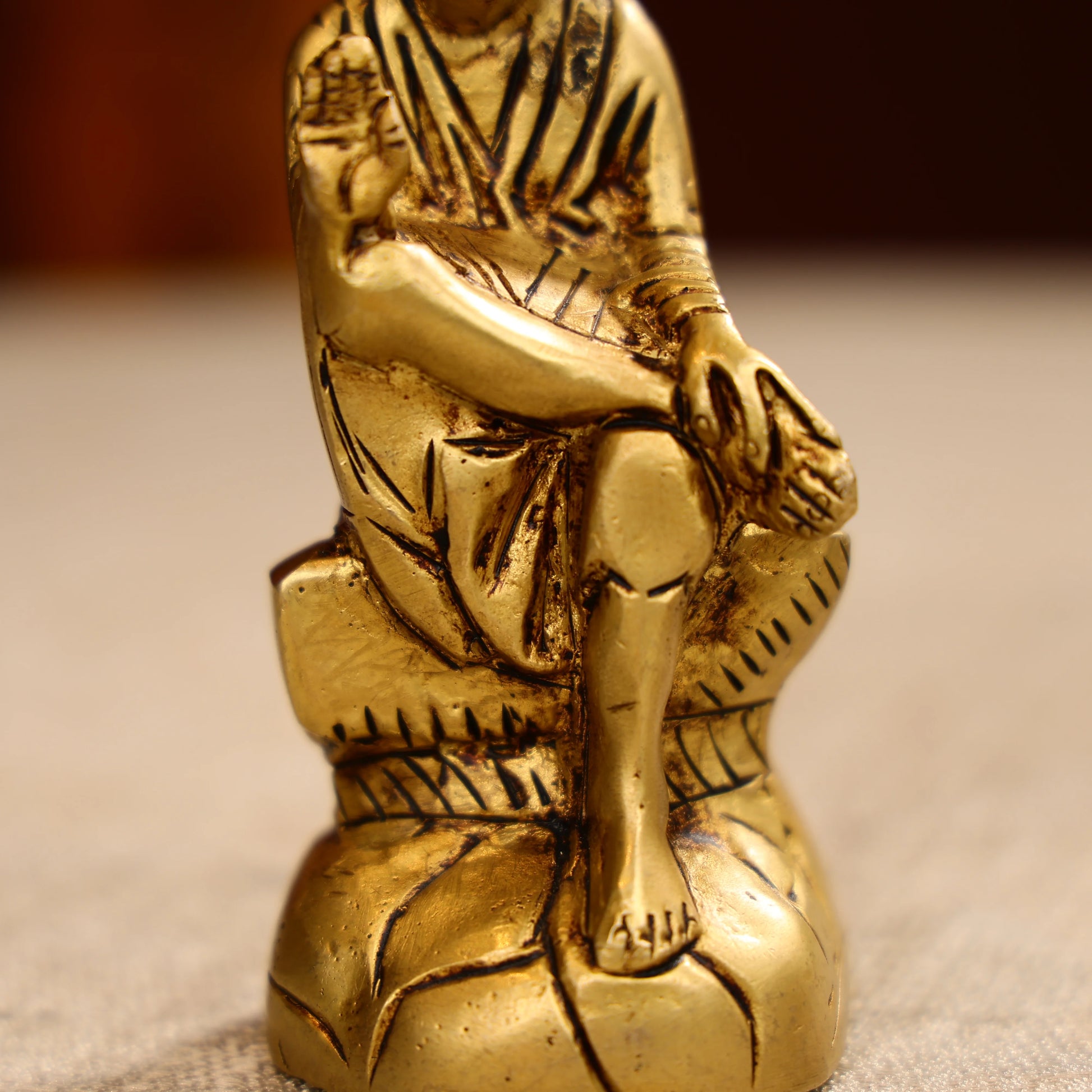 4.5 Brass Lord Sai Baba Idol Seated on Pedestal