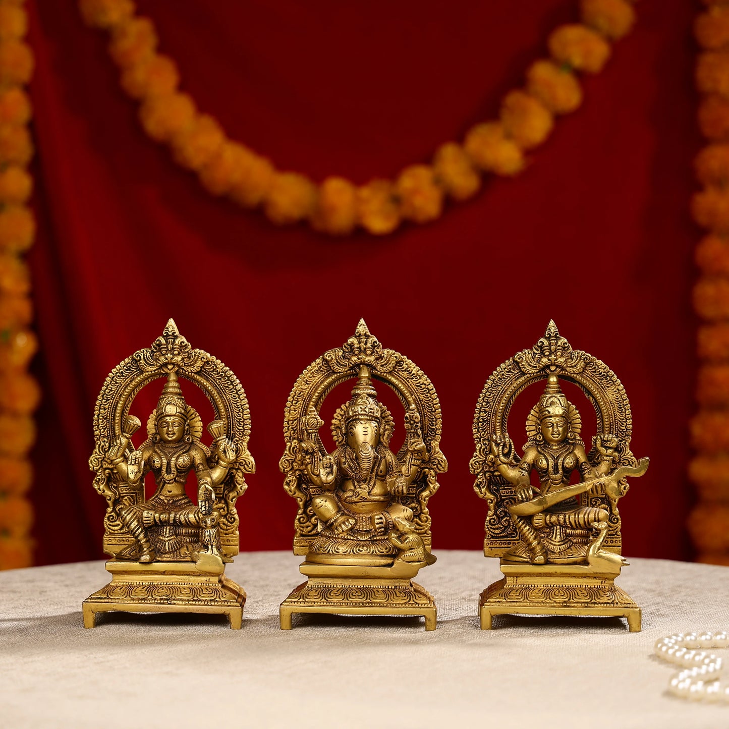 Brass Lakshmi Ganesha And Saraswati Trio Idols Seated On Throne