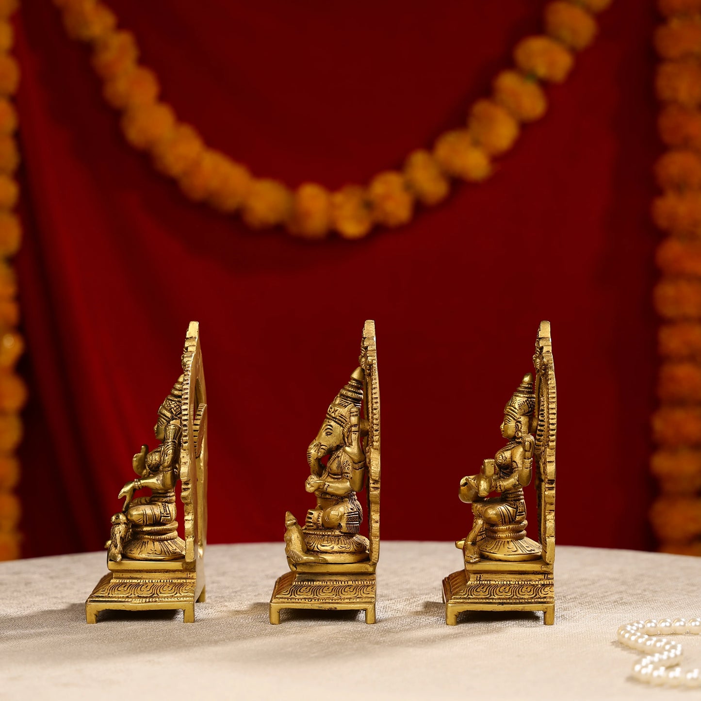 Brass Lakshmi Ganesha And Saraswati Trio Idols Seated On Throne