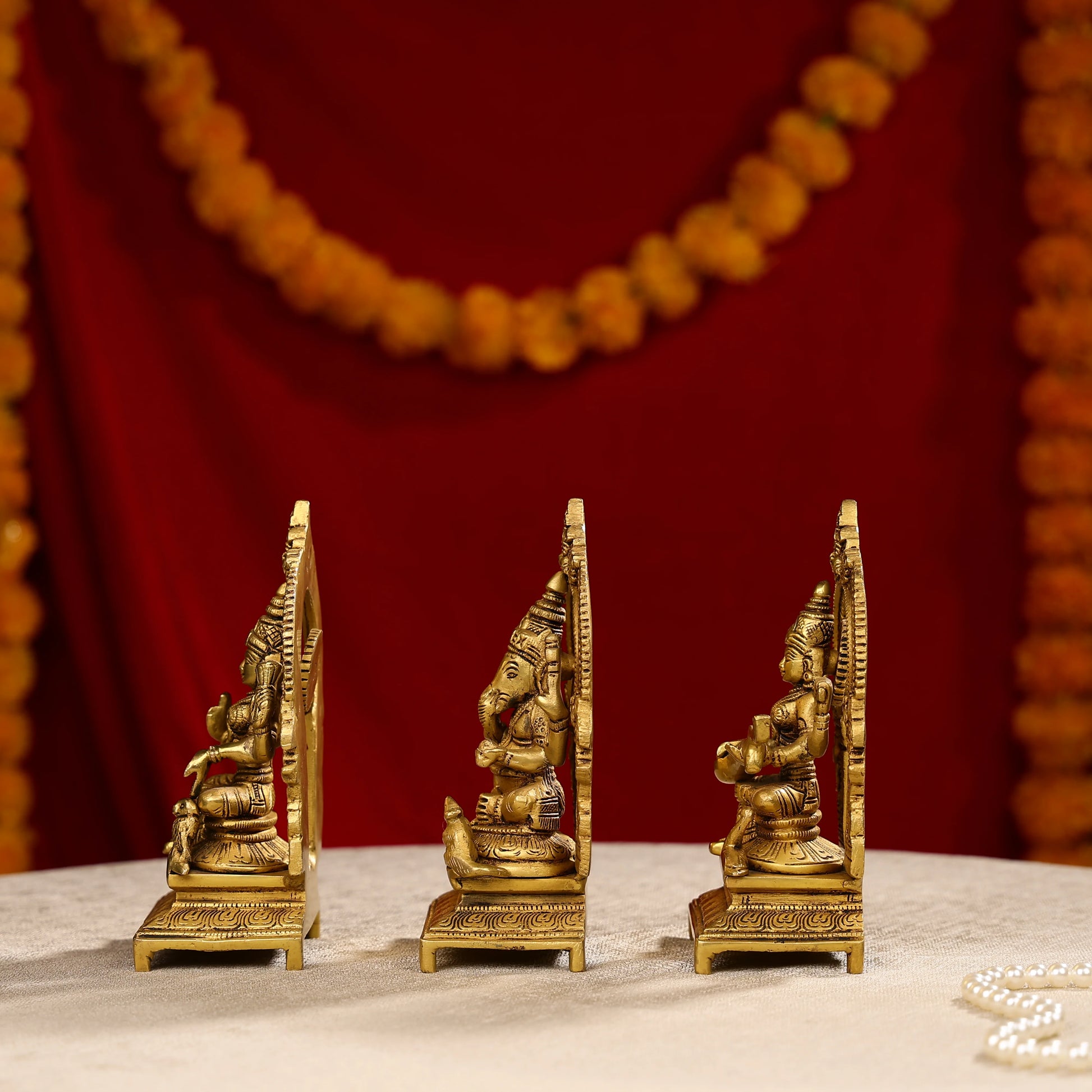 Brass Lakshmi Ganesha And Saraswati Trio Idols Seated On Throne