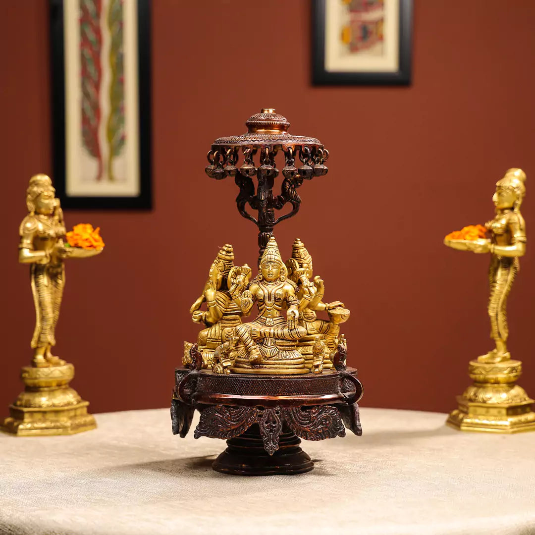 Revolving Three-Sided Idol Of Goddess Lakshmi, Goddess Saraswati And Lord Ganesh