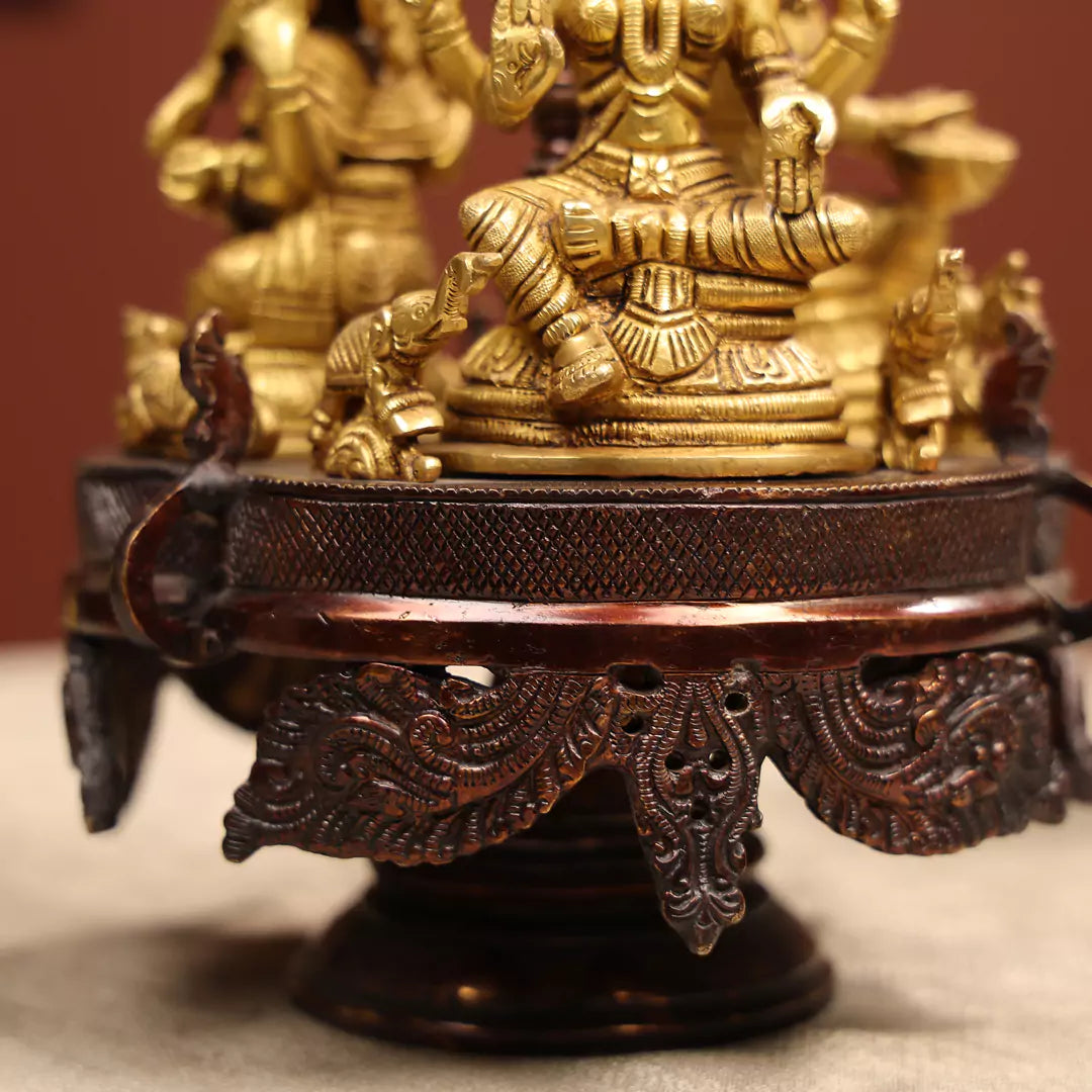 Revolving Three-Sided Idol Of Goddess Lakshmi, Goddess Saraswati And Lord Ganesh