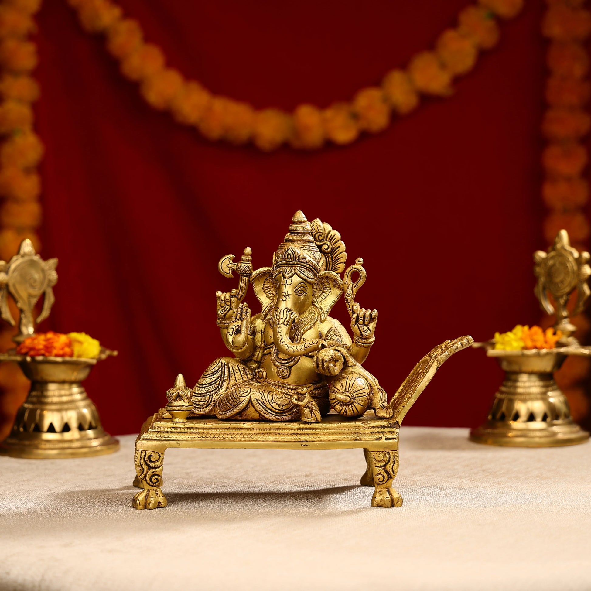 9_Brass_Super_Fine_Blessing_Lord_Ganesha_Resting_On_Sofa_1
