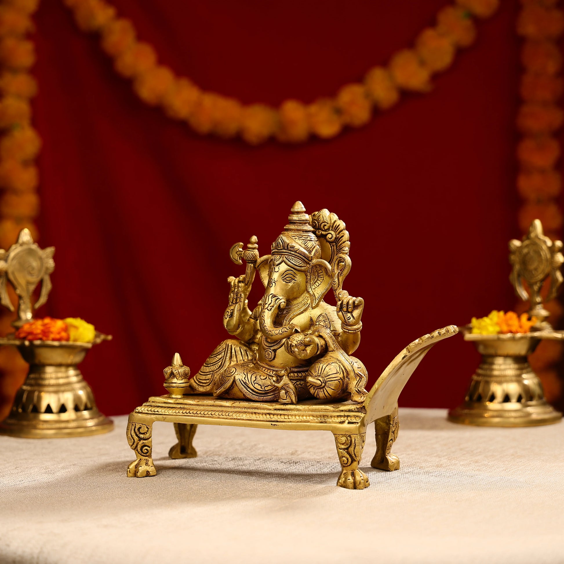9_Brass_Super_Fine_Blessing_Lord_Ganesha_Resting_On_Sofa_2