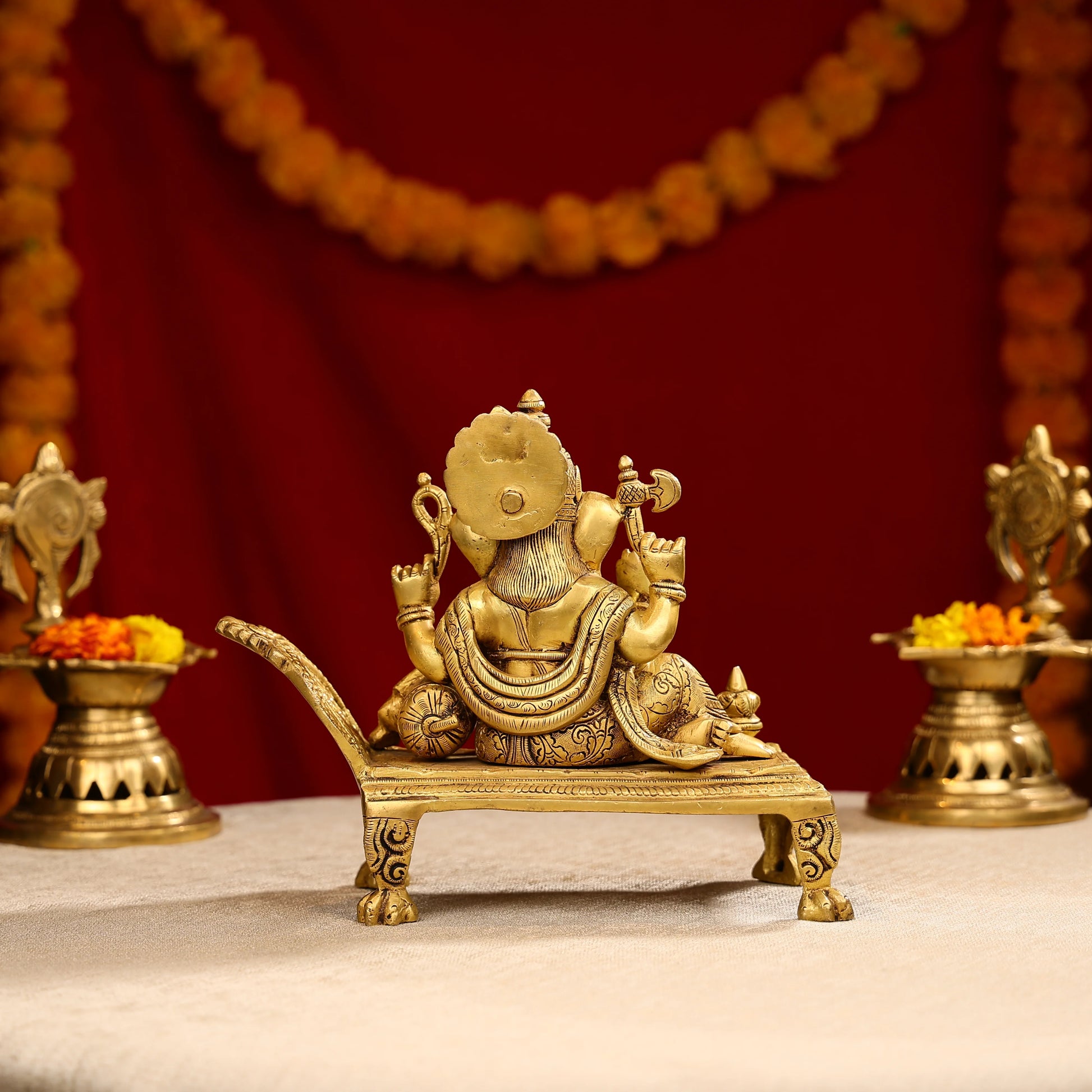 9_Brass_Super_Fine_Blessing_Lord_Ganesha_Resting_On_Sofa_4