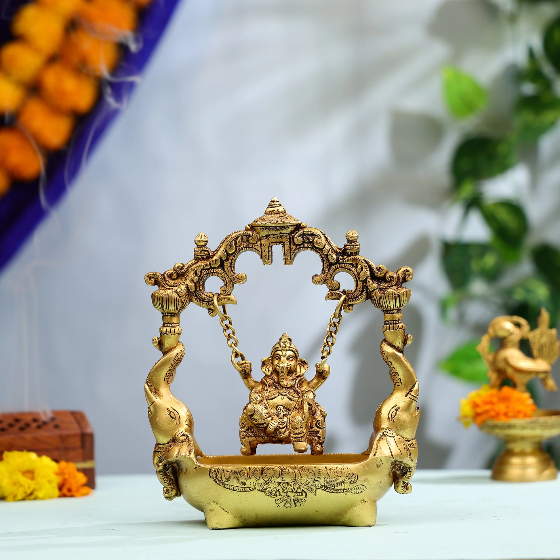 9_Super_Fine_Brass_Lord_Ganesha_Swinging_Idol_On_Elephant_Urli_1