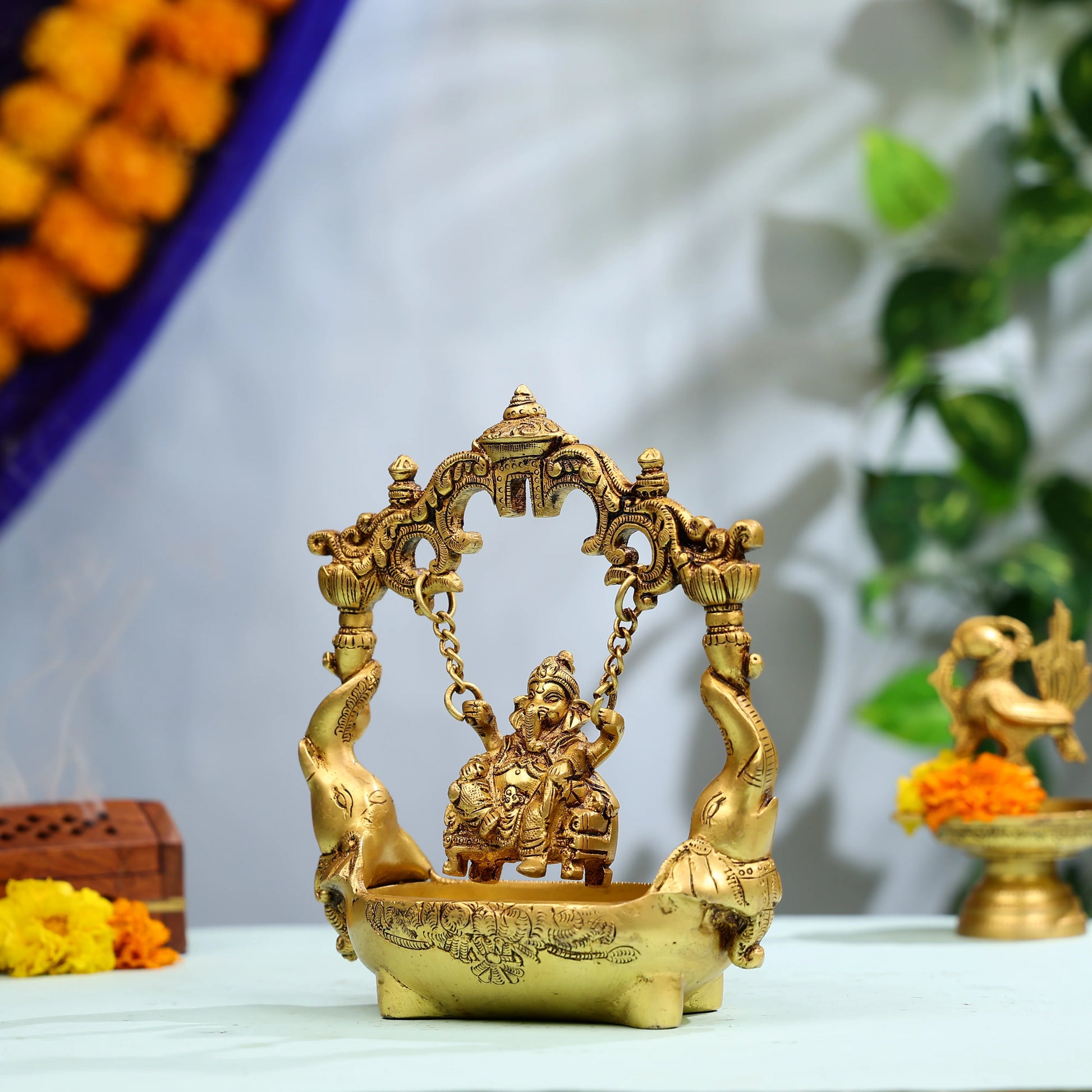 9_Super_Fine_Brass_Lord_Ganesha_Swinging_Idol_On_Elephant_Urli_2