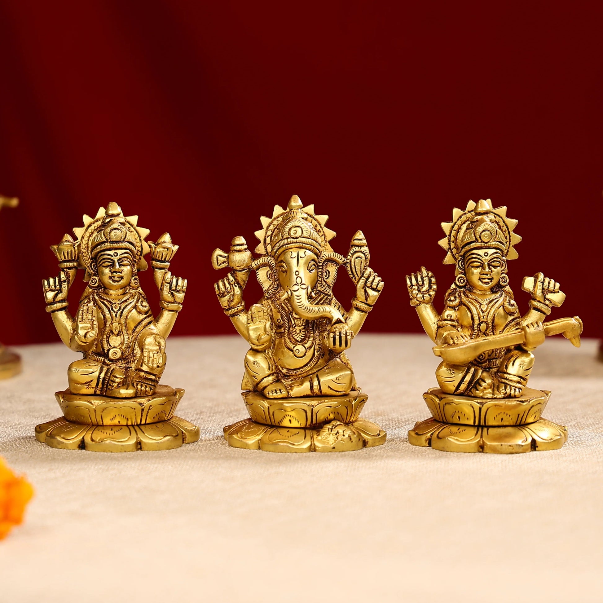 Brass Super Fine Goddess Laxmi Lord Ganesha Goddess Saraswati Trio Idols Seated on Lotus Base