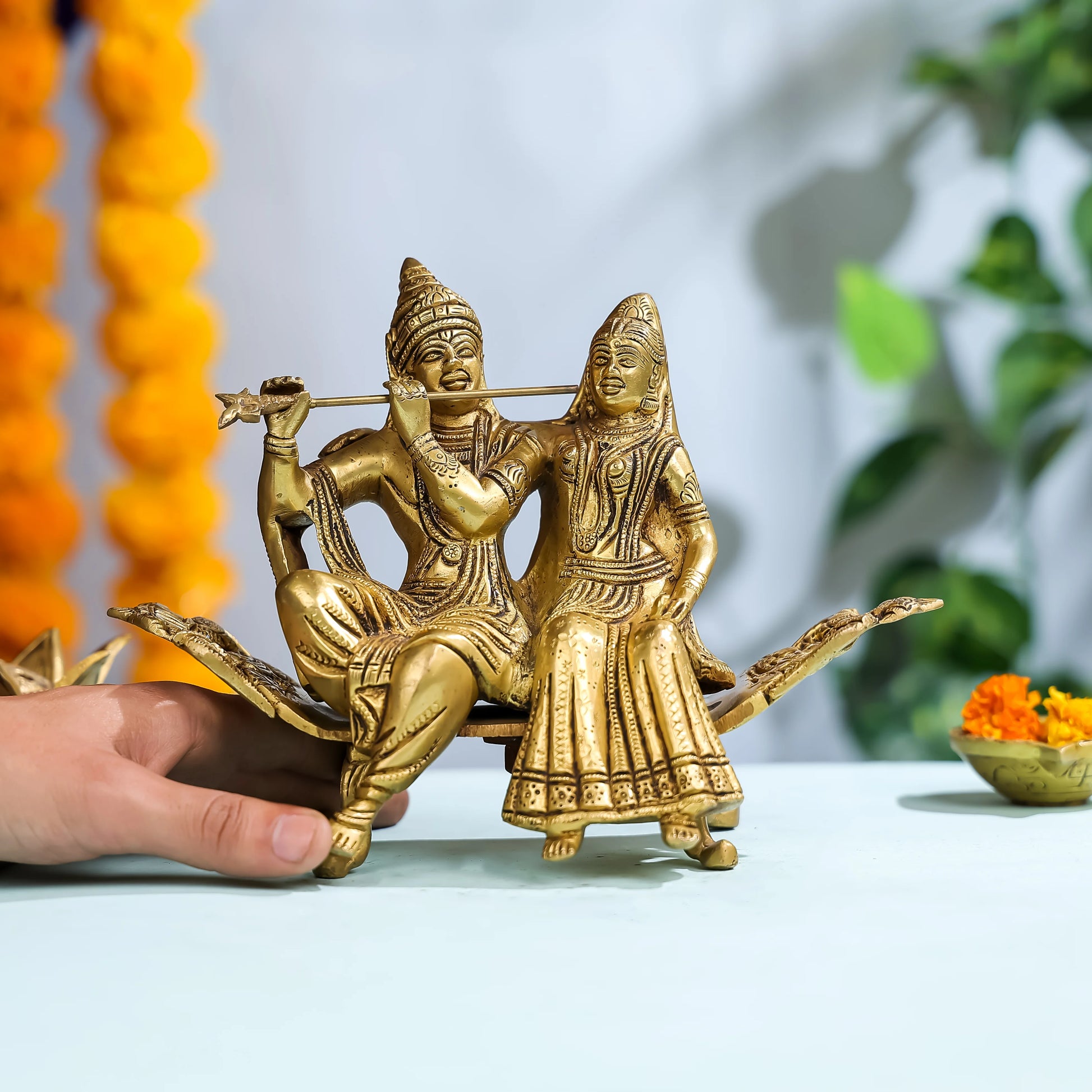 Brass Goddess Radha & Krishna Seated on Sofa 3