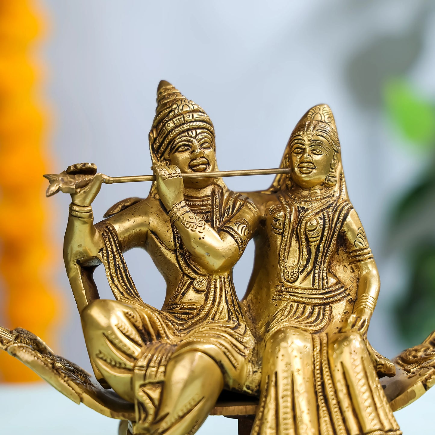 Brass Goddess Radha & Krishna Seated on Sofa 4