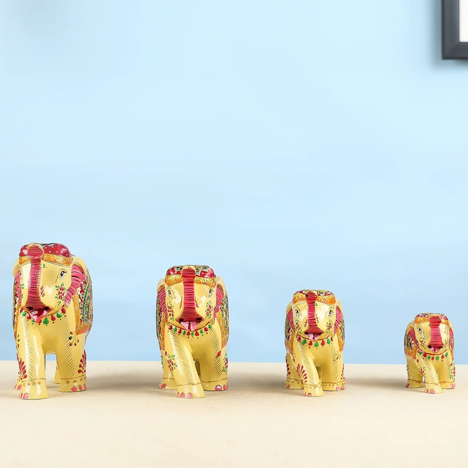 Handcrafted Set Of Four Golden Elephant Figurines With Traditional Art
