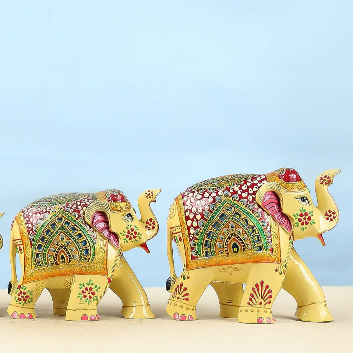 Handcrafted Set Of Four Golden Elephant Figurines With Traditional Art