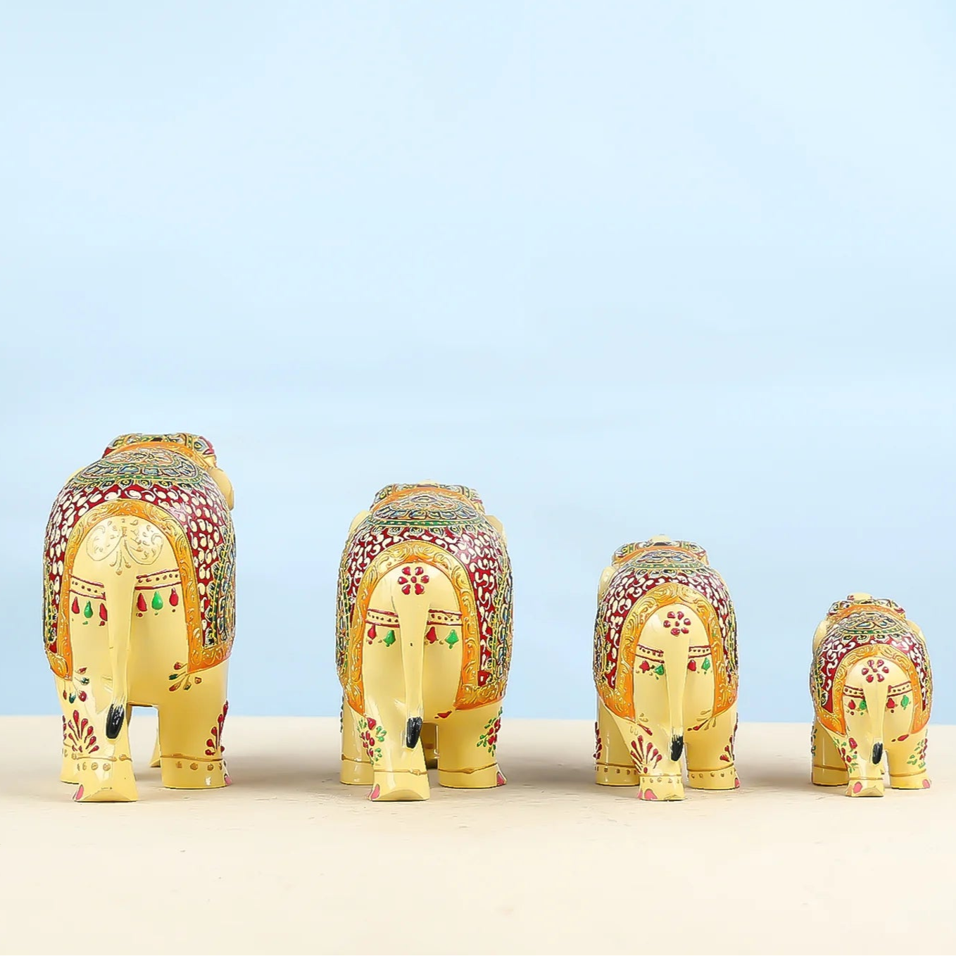 Handcrafted Set Of Four Golden Elephant Figurines With Traditional Art