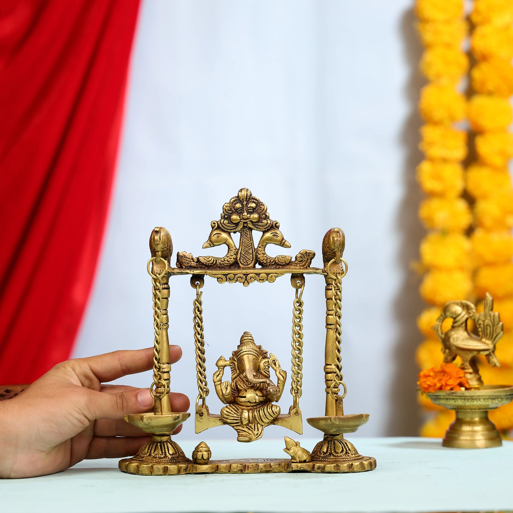 Brass Lord Ganesha on Swings Idol with Hanging Panch Diya on Both sides
