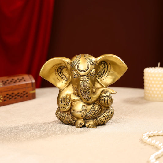 Gold Toned Lord Ganesh Brass Idol In A Sitting Posture