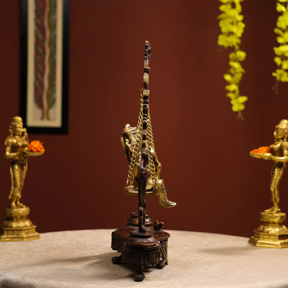 Coloured Brass Idol Of Lord Ganesha On A Swing