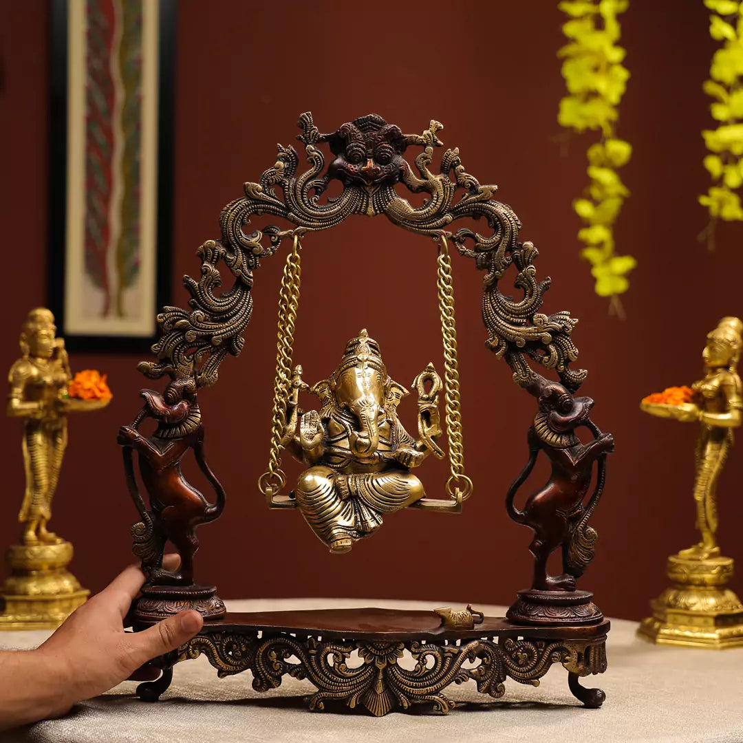 Coloured Brass Idol Of Lord Ganesha On A Swing