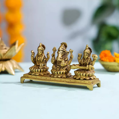 Brass Goddess Lakshmi, Lord Ganesh And Goddess Saraswati Sitting On Lotuses