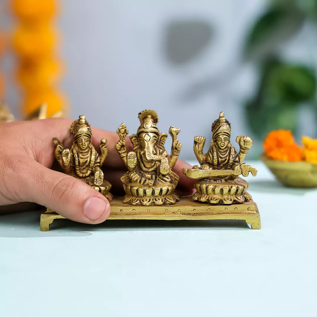 Brass Goddess Lakshmi, Lord Ganesh And Goddess Saraswati Sitting On Lotuses