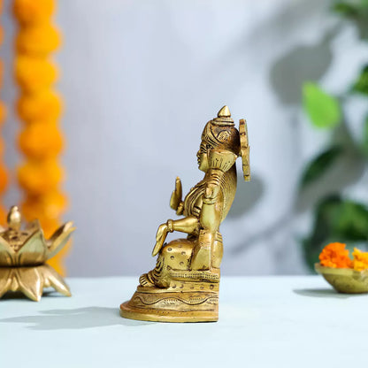 Brass Goddess Lakshmi Sitting On A Pedestal