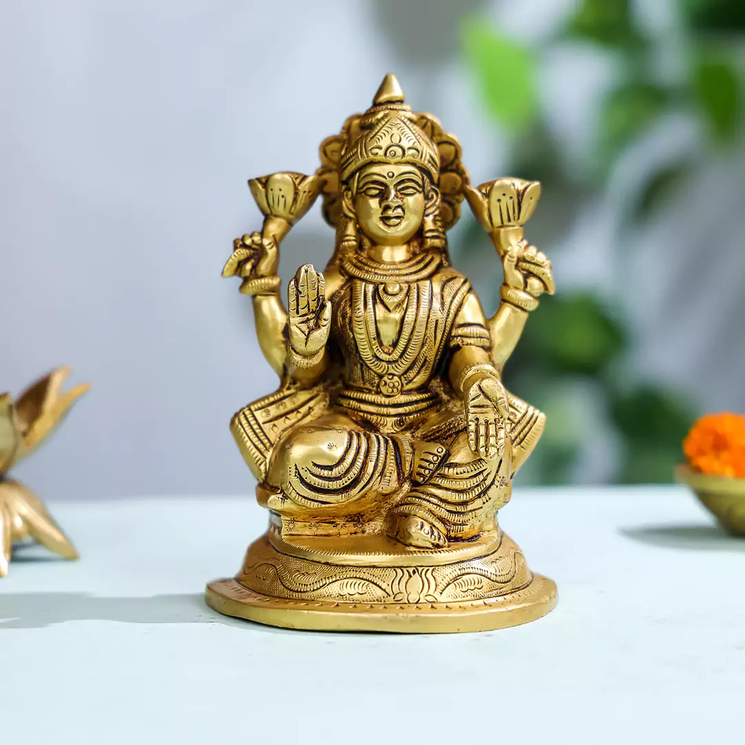 Brass Goddess Lakshmi Sitting On A Pedestal