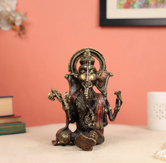 9" Dhokra Art Tribal Coloured Lord Ganesha Seated In A Resting Posture