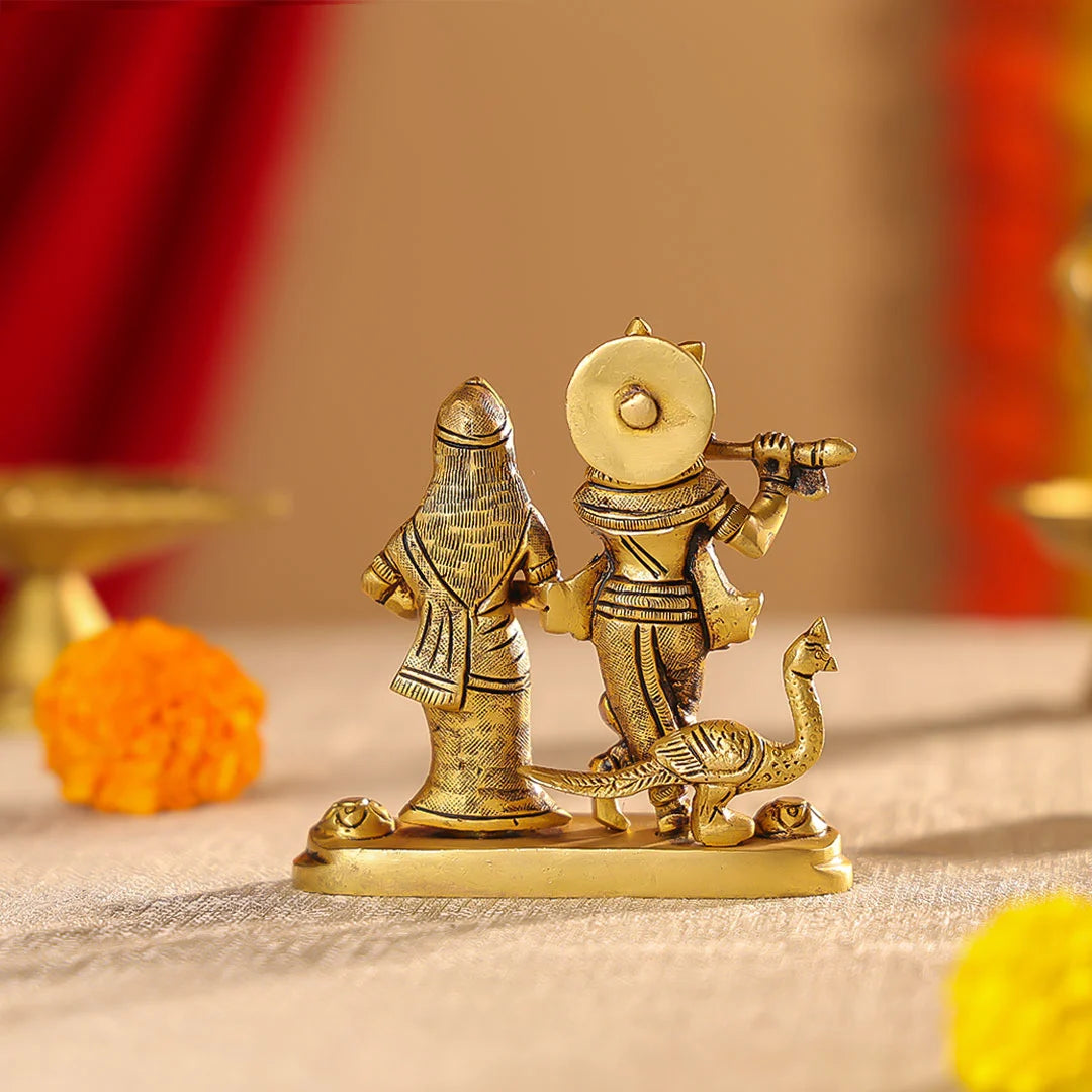 Brass Superfine Radha Krishna Idol On Pedestal With A Peacock Idol