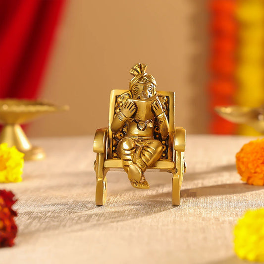 Brass Superfine Lord Ganesha Seated On A Rocking Chair