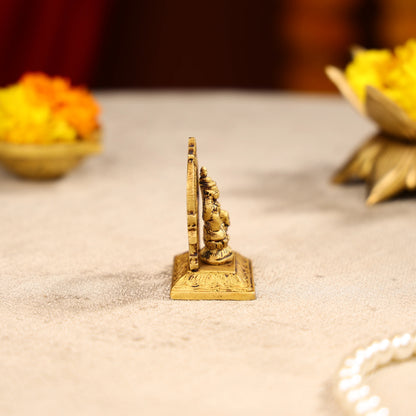 Brass Lord Lakshmi Idol In Traditional Arch Design