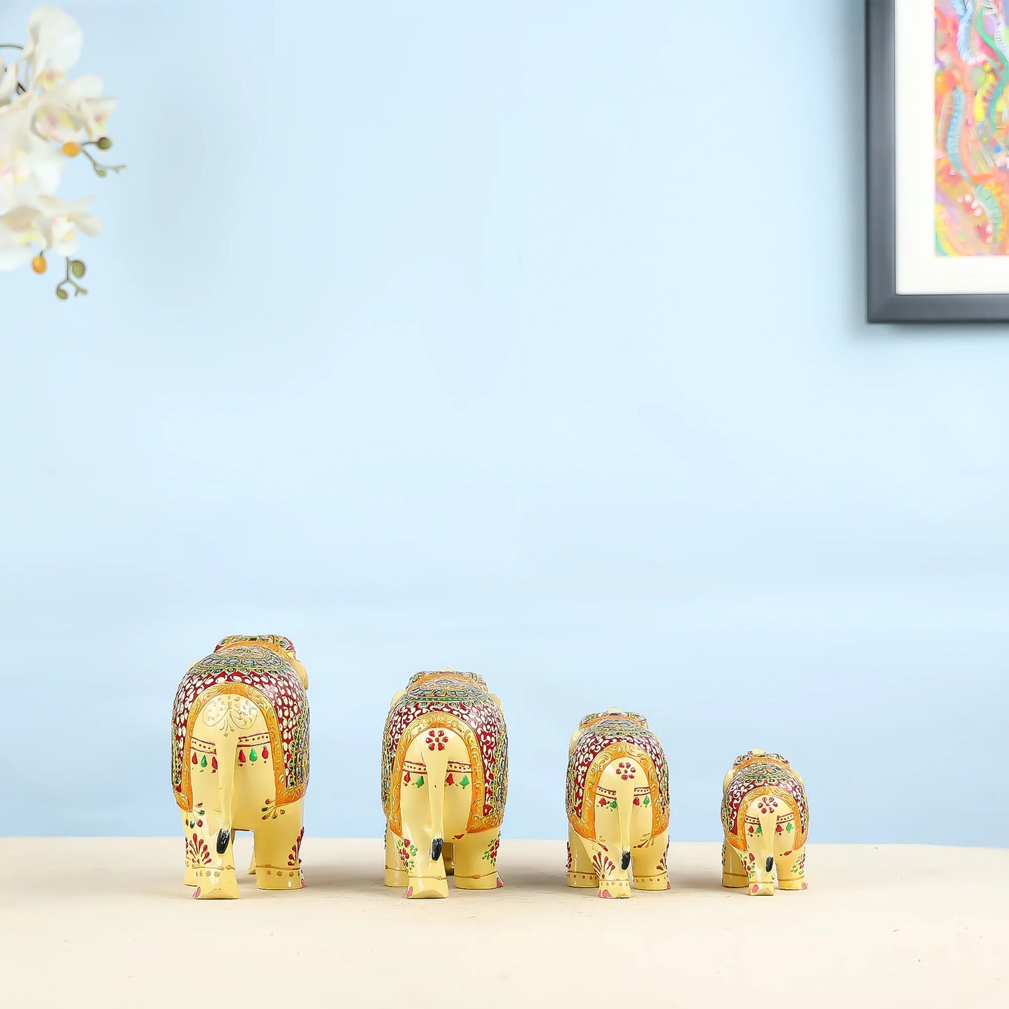 Handcrafted Set Of Four Golden Elephant Figurines With Traditional Art