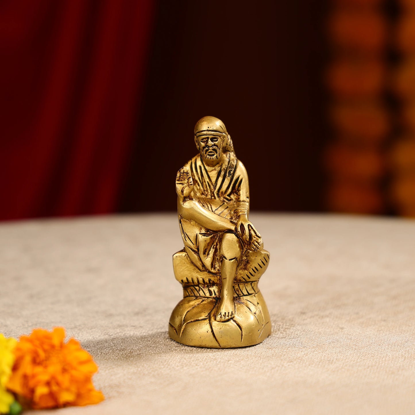 Brass Lord Sai Baba Idol Seated on Pedestal- 4.5 Inch