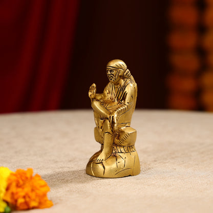 Brass Lord Sai Baba Idol Seated on Pedestal- 4.5 Inch