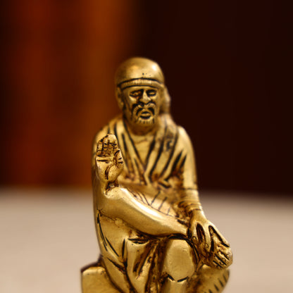 Brass Lord Sai Baba Idol Seated on Pedestal- 4.5 Inch