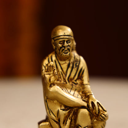 Brass Lord Sai Baba Idol Seated on Pedestal- 4.5 Inch