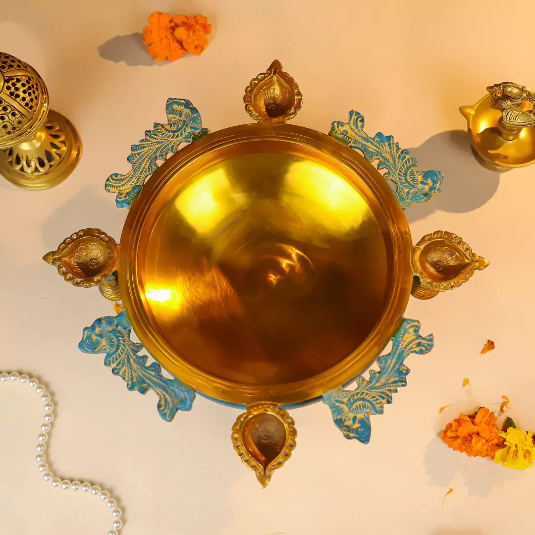 Brass Urli With Diyas On The Edge With Bells